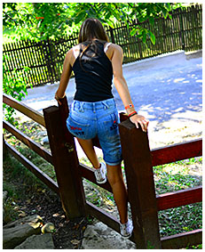 sexy teen pisses her jeans shorts climbing a fence wetting herself pissing her pants 04