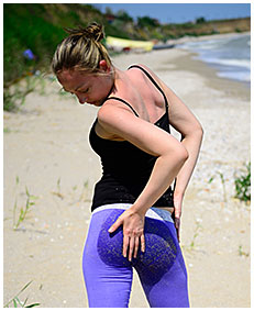 yoga tights leaking on beach 01
