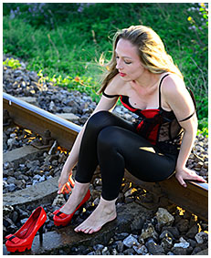 shiny tights on railroad track 0