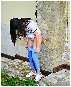 she was walking and pissing her jeans outside 02