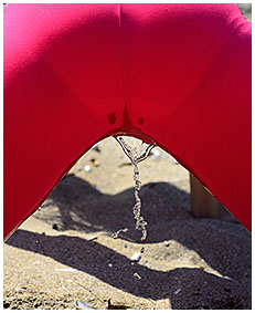 lady pees herself on the beach 4