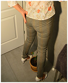 office lady pees in her pants while trying to water office plant 0