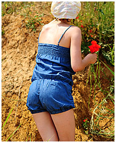 alice pees her denim overalls picking flowers 04