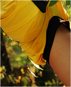 dee climbing down a tree pees her yellow shorts2
