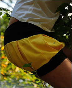 dee climbing down a tree pees her yellow shorts5