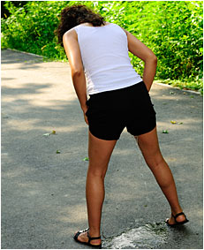 Taking a walk in the park Sara wets her shorts