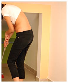 hot girl peeing herself wetting her black pants 2
