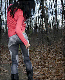 wetting jeans while walking in the park pissing her jeans 0048